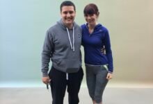 Elizabeth Rizzini presenting the weather on BBC News with studio graphics in the background.”