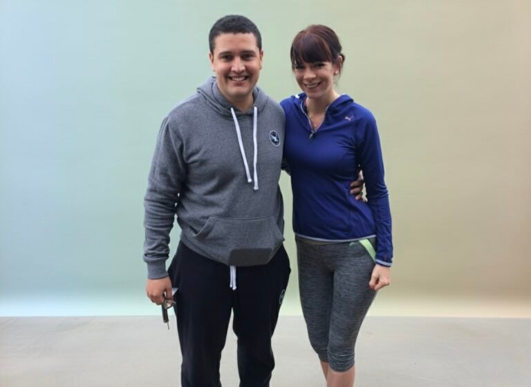 Elizabeth Rizzini presenting the weather on BBC News with studio graphics in the background.”