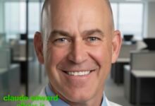 Portrait of Claude Edward Elkins Jr., Executive Vice President and Chief Commercial Officer at Norfolk Southern, standing confidently, symbolizing leadership in modern rail logistics and transformation in the freight industry